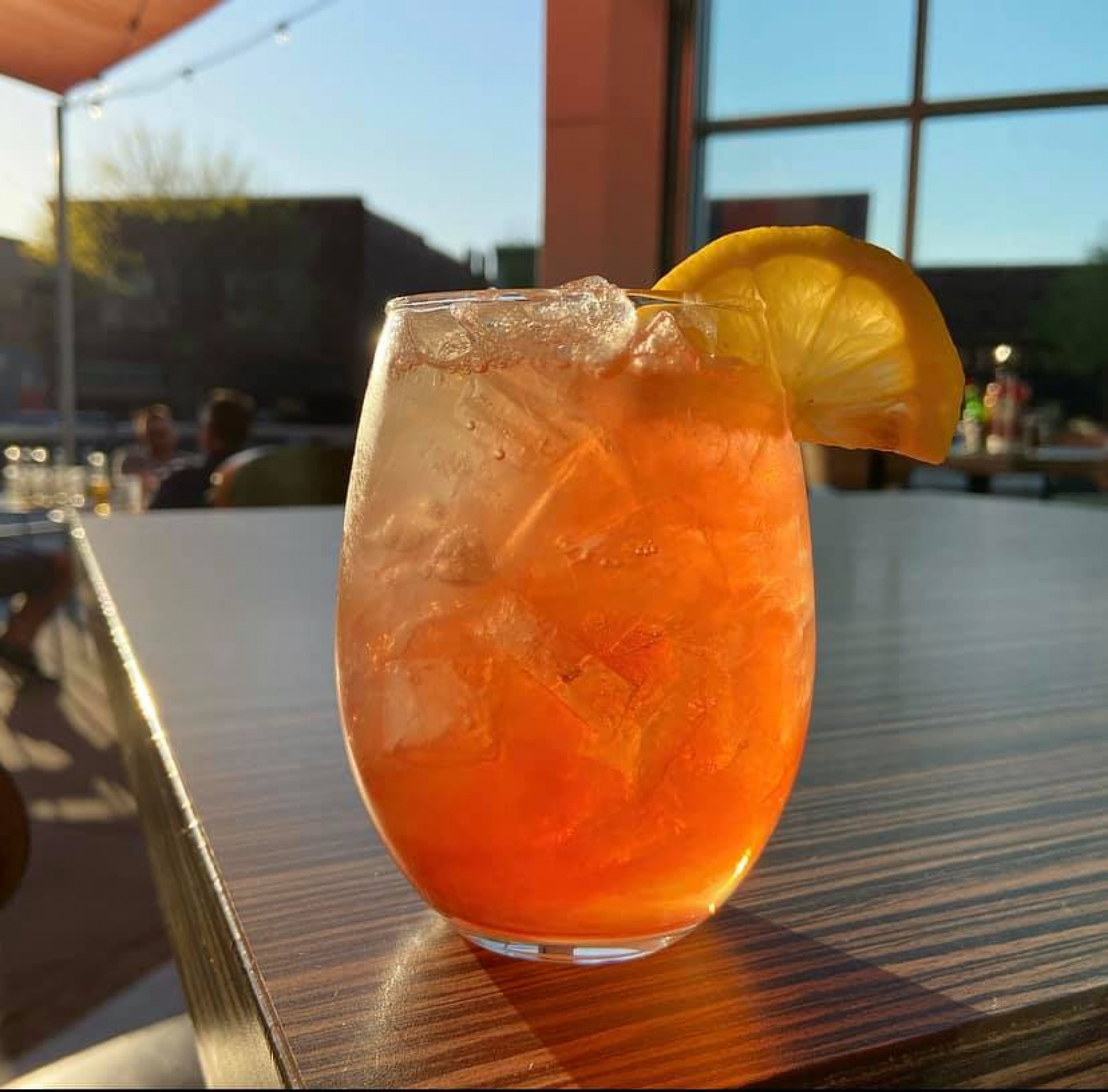 Photo of a drink on the Caddys patio