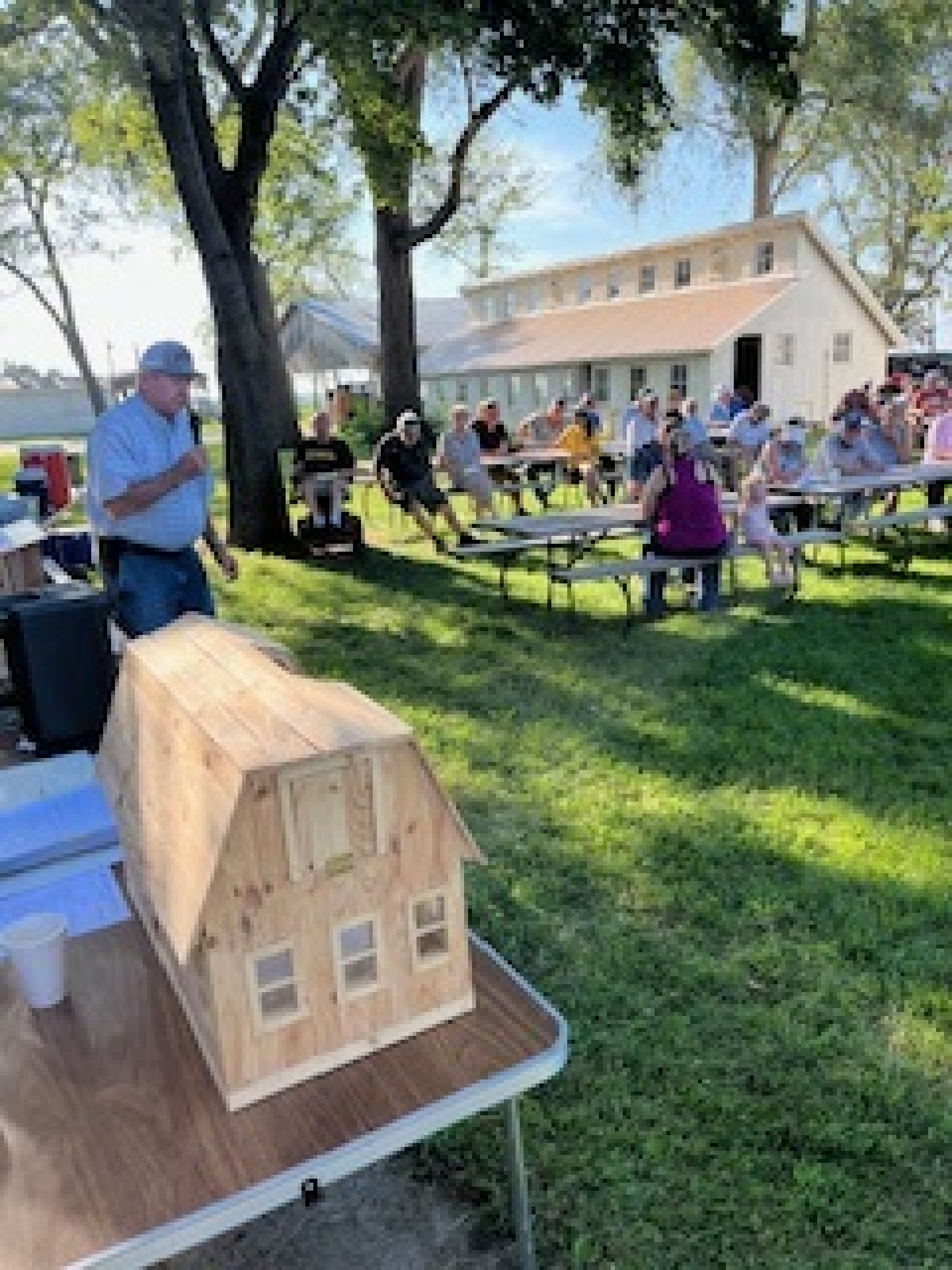 A large group listens during a Carstens Farm Days Planning Meeting