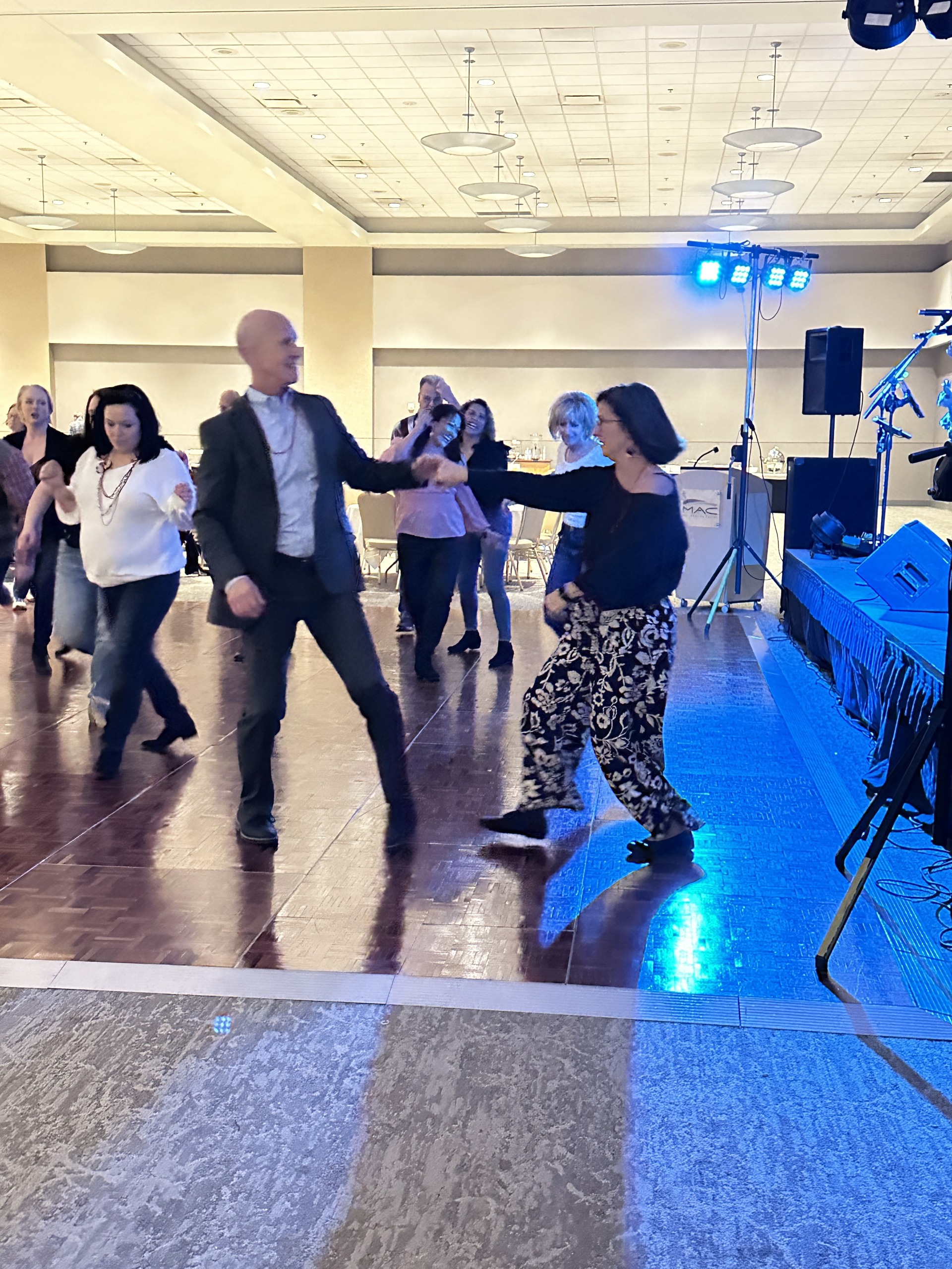 People dancing on a stage at the Mid-America Center