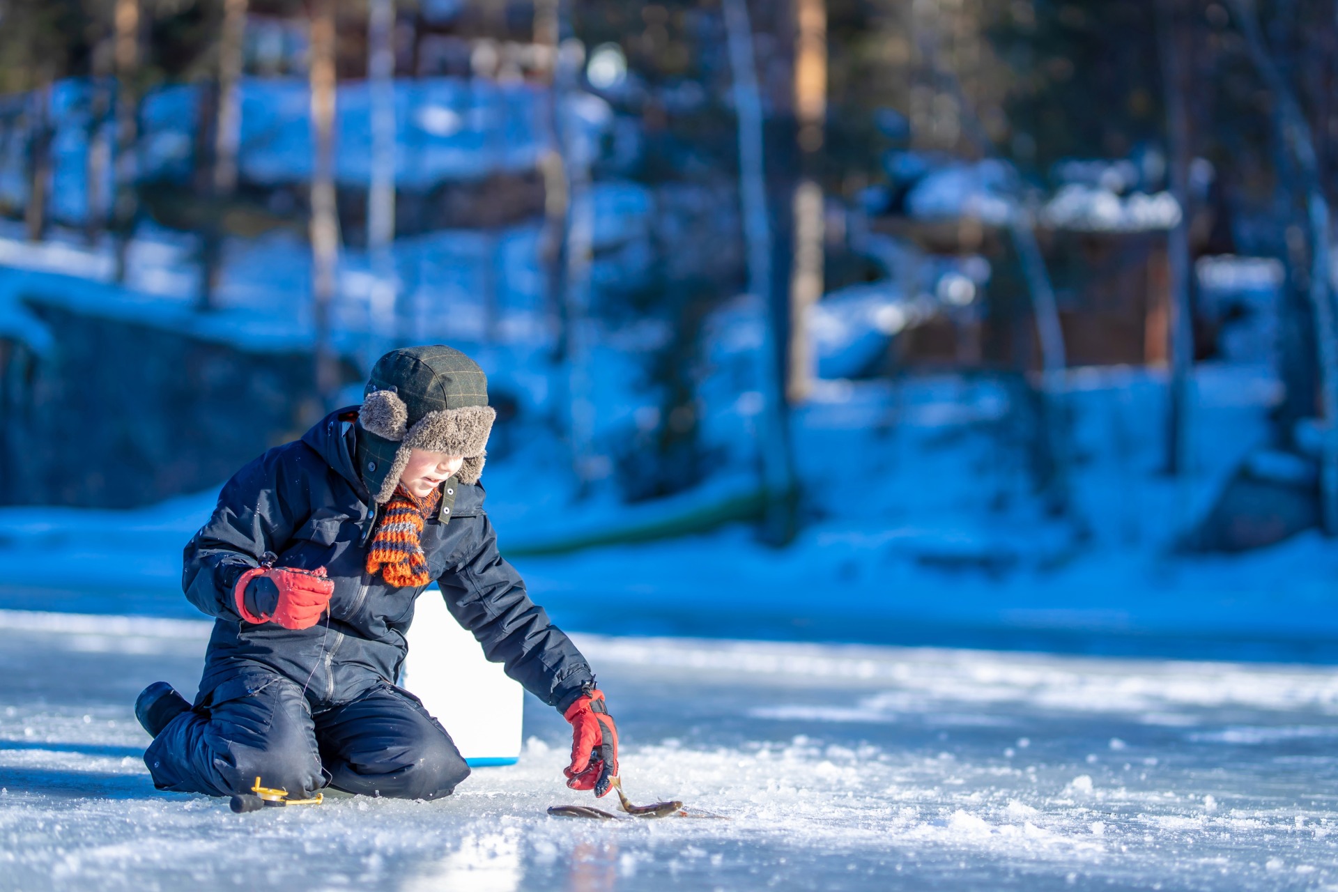 Ice fishing at a lake