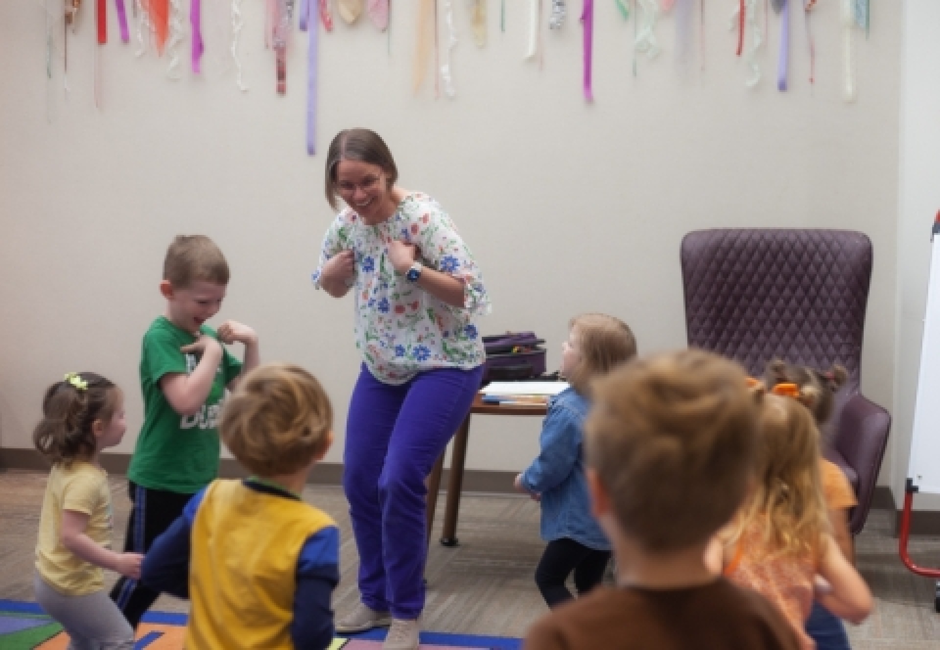 Lady dancing at storytime at the library