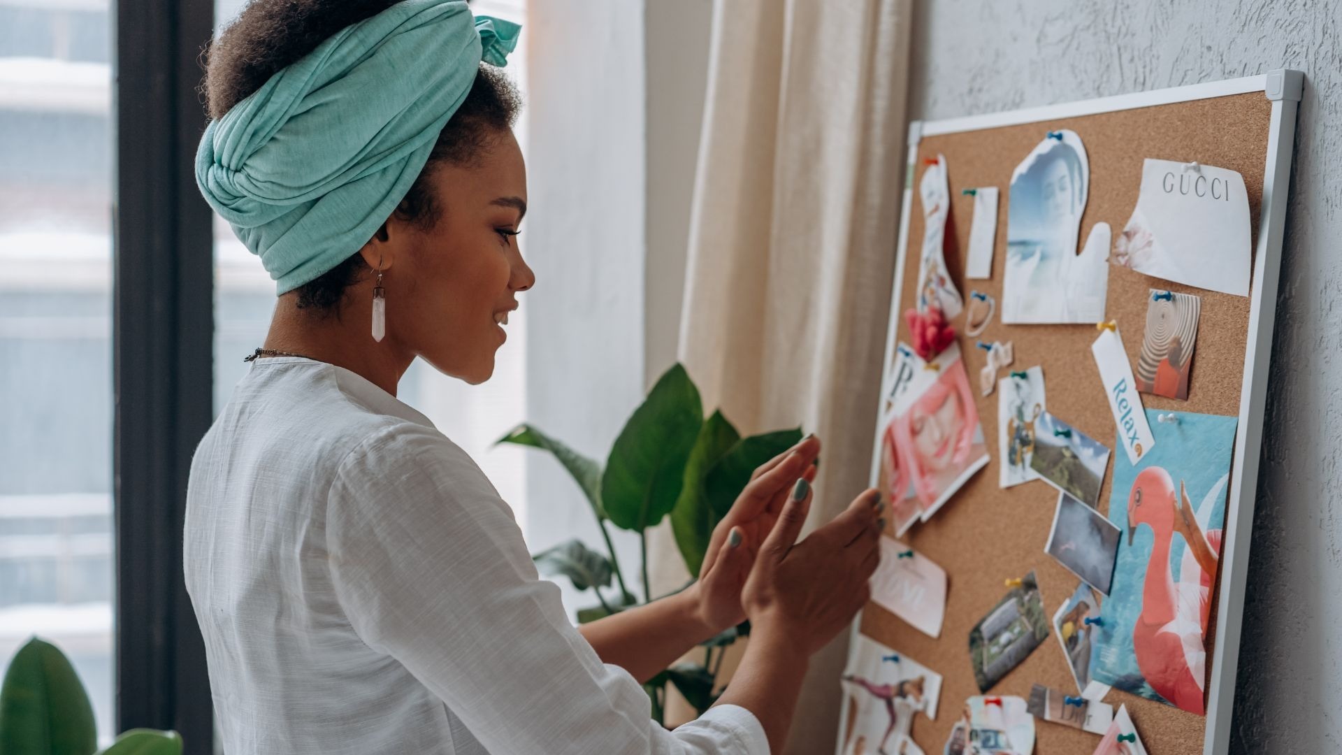 Woman creating a vision board