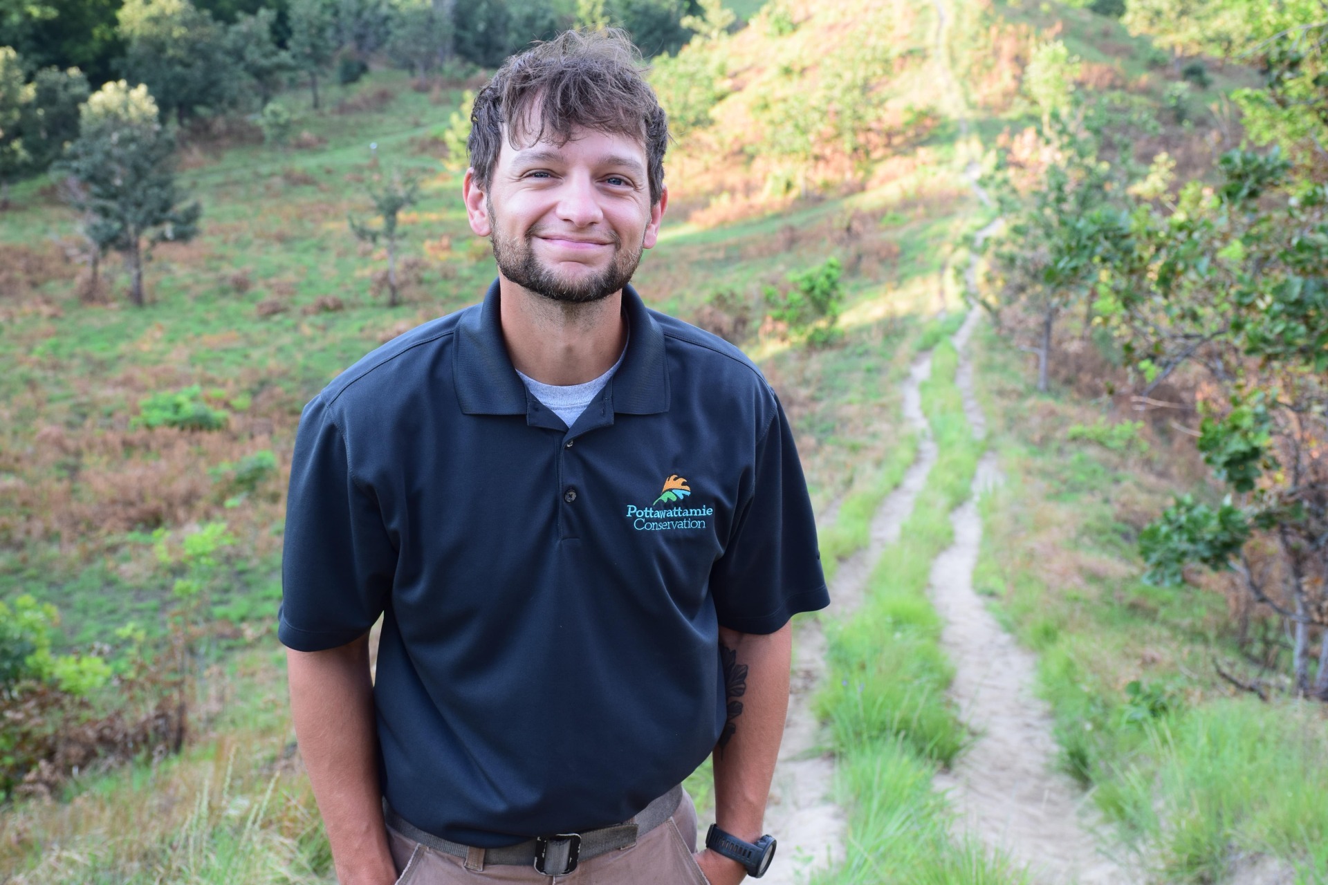 Jeremy Yost poses in front of Angel's Dead End trail at Hitchcock.