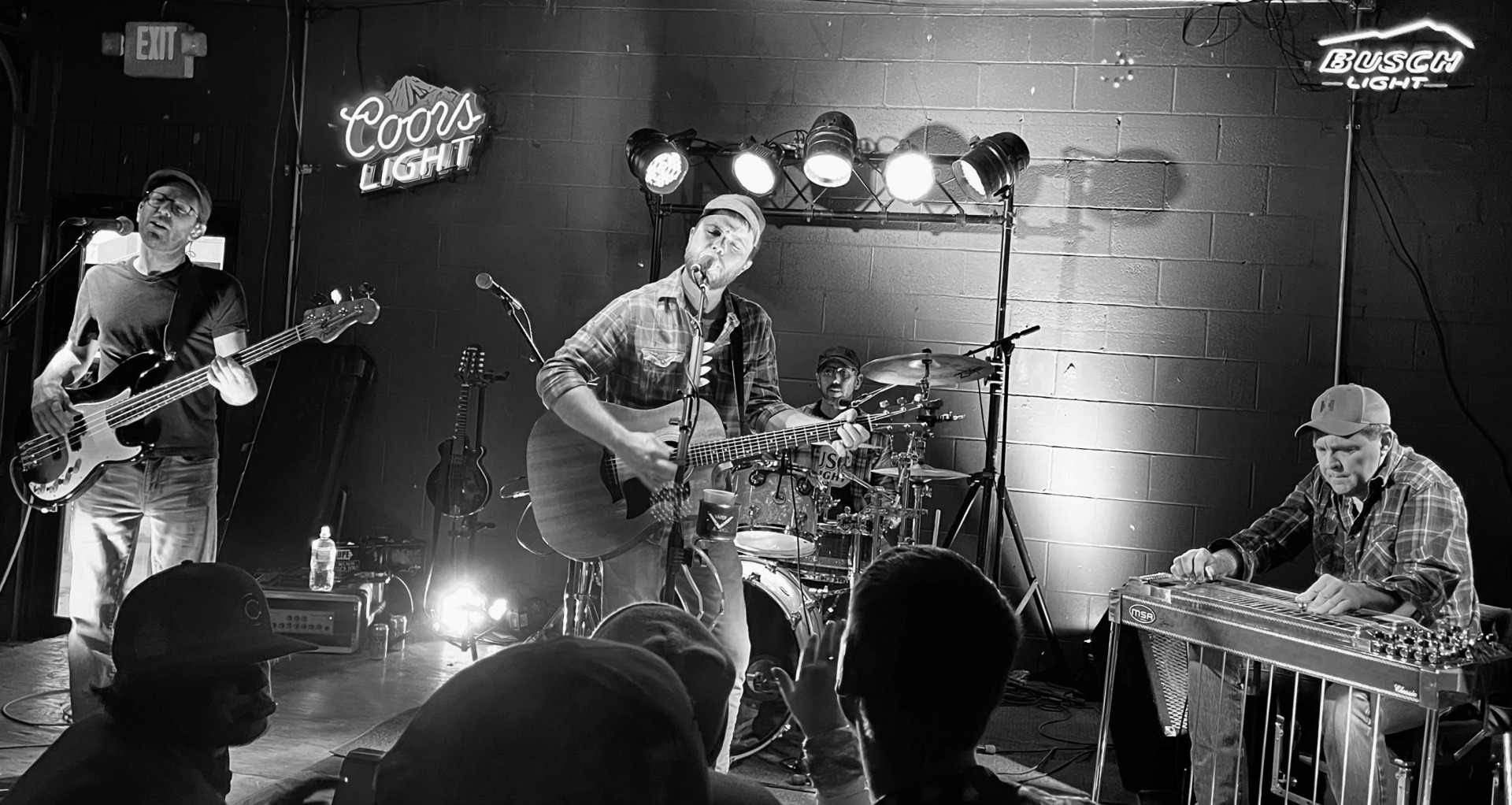 JayR Brink Band members playing a set. 