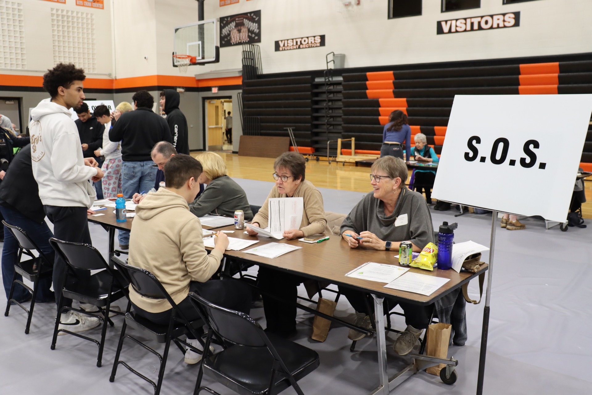 Students at the S.O.S. table at the Reality 101 fair.
