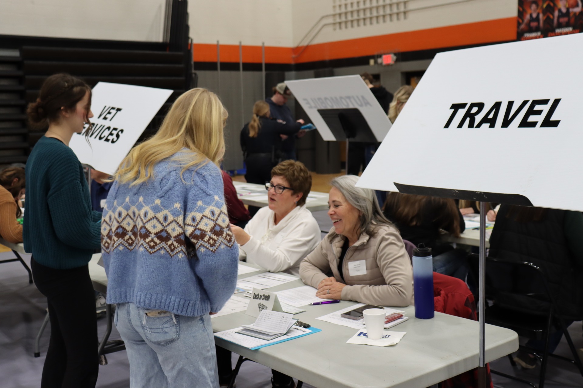 Students at the Travel table at the Reality 101 fair.
