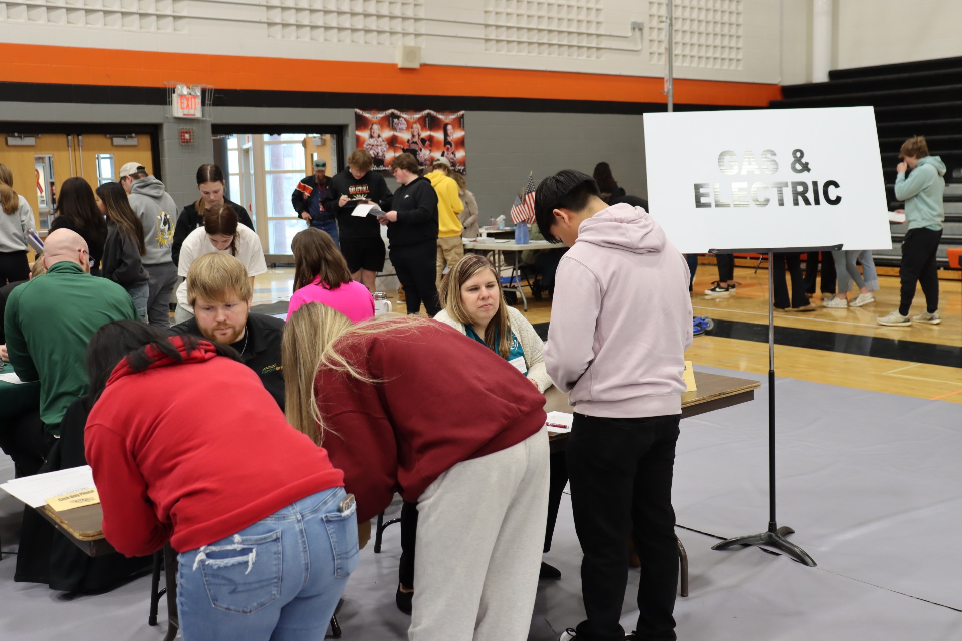 Students at the Gas and Electric table at the Reality 101 fair.